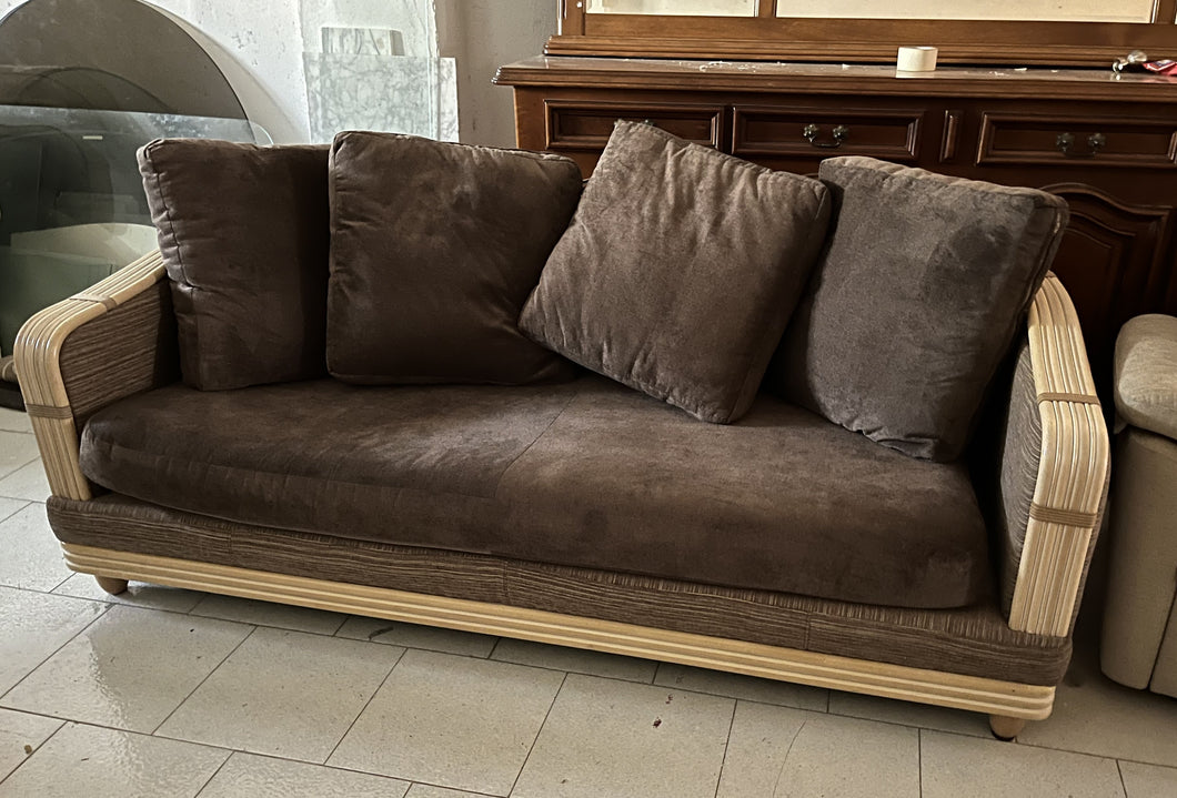 1128 - Small cane sofa and brown fabric cushions.