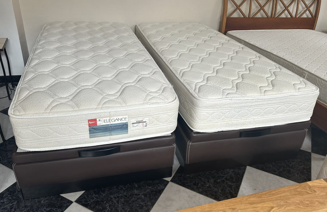 1055 - Two single canapè (lift up base) + mattress (90cm x 200cm). Sold together. 495€ for both complete beds!