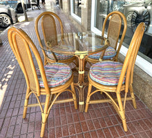 Load image into Gallery viewer, 1028 - Round bamboo glass table (90cm) + 4 chairs + cushions. 225€ for the set
