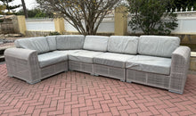 Load image into Gallery viewer, 1153 - Modular outdoor sofa. SOFA BASE IS IN GOOD CONDITION (CLICK FOR PHOTOS) BUT CUSHIONS NEED NEW COVERS. A project for a seamstress!  The modules can be placed in any shape, but as photo the sides are: 190 &amp; 350cm.
