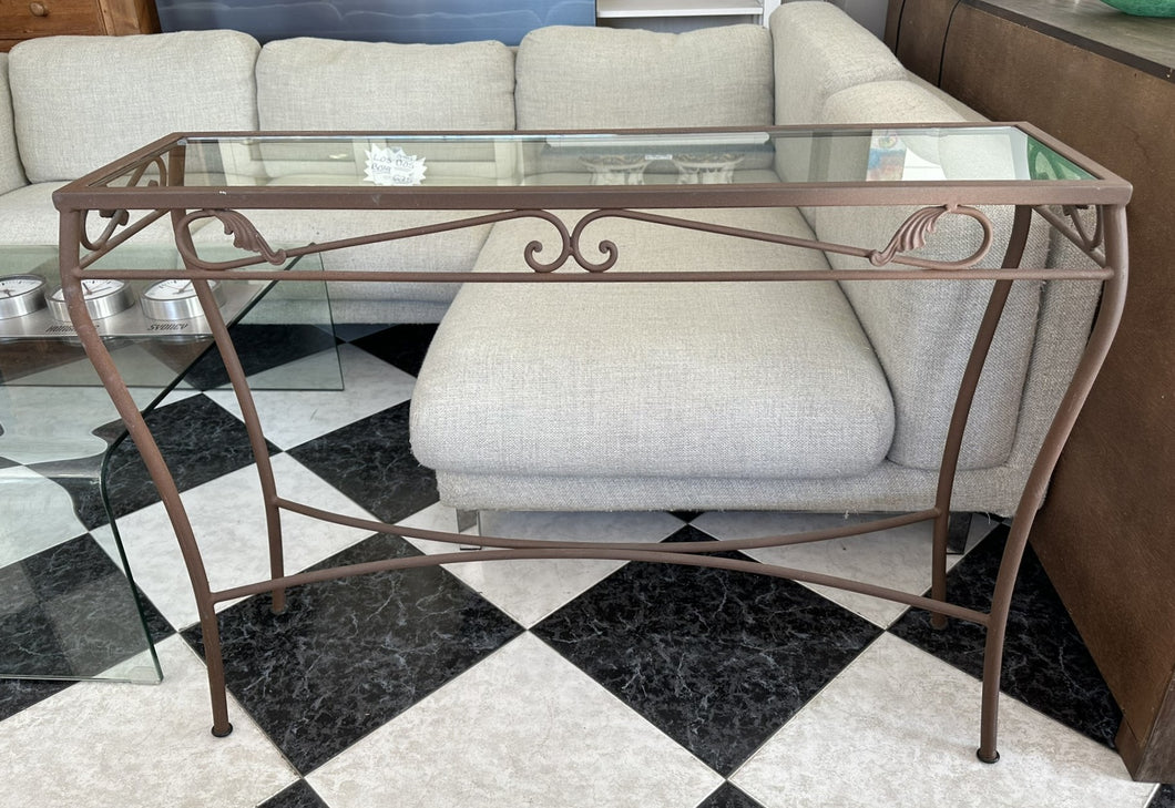 1048 - Wrought iron console table with glass top (112cm x 30cm, 82cm high)