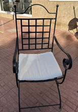 Load image into Gallery viewer, 1100 - Heavy wrought iron armchair with cushion.
