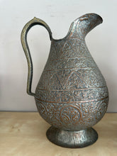 Cargar imagen en el visor de la galería, 1110 -  Left: Antique India Brass Handmade Engraved Jug(30cm high) 85€ Middle: Antique Islamic Indo-Persian tin-plated copper vase, 19th century 85€. Right; Antique Islamic Jug 85€
