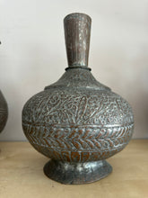 Cargar imagen en el visor de la galería, 1110 -  Left: Antique India Brass Handmade Engraved Jug(30cm high) 85€ Middle: Antique Islamic Indo-Persian tin-plated copper vase, 19th century 85€. Right; Antique Islamic Jug 85€
