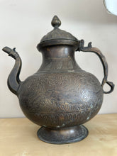Cargar imagen en el visor de la galería, 1110 -  Left: Antique India Brass Handmade Engraved Jug(30cm high) 85€ Middle: Antique Islamic Indo-Persian tin-plated copper vase, 19th century 85€. Right; Antique Islamic Jug 85€
