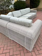 Load image into Gallery viewer, 1153 - Modular outdoor sofa. SOFA BASE IS IN GOOD CONDITION (CLICK FOR PHOTOS) BUT CUSHIONS NEED NEW COVERS. A project for a seamstress!  The modules can be placed in any shape, but as photo the sides are: 190 &amp; 350cm.
