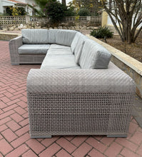 Load image into Gallery viewer, 1153 - Modular outdoor sofa. SOFA BASE IS IN GOOD CONDITION (CLICK FOR PHOTOS) BUT CUSHIONS NEED NEW COVERS. A project for a seamstress!  The modules can be placed in any shape, but as photo the sides are: 190 &amp; 350cm.
