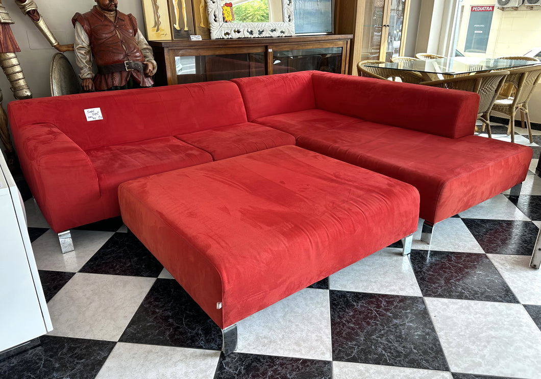 1005 - Large red modular sofa! In good condition (looks dirty due to the way the fabric is laying, velvet style) In the shape that they are placed in the photo the sides are: 270cm & 210cm   (and foot stool: 105cm x 118cm)