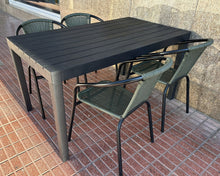 Load image into Gallery viewer, 1039 - PVC table (139cm x 78cm) and 4 chairs.
