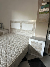Cargar imagen en el visor de la galería, 1121 - Mattress (150cm x 190cm) + faux leather base + headboard + 2 bedside tables. (The headboard is reversable, see photos!, 160cm wide and 121cm high) + 2 bedside tables (50cm x 35cm, 61cm high) All in very good condition!
