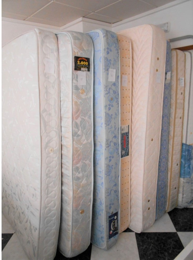1250 - Lots of double pre-owned mattresses right now in the port shop (singles as well!) Nice and clean and between 25-125€ each.